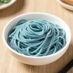 a bowl of blue spaghetti, food photography
