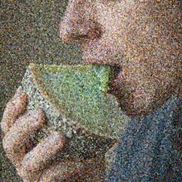 closeup of a man tasting a stinking old green cheese