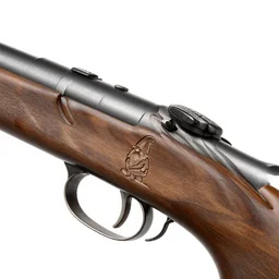 A musket with  an engraving of a tiny gnome on the barrel.