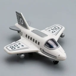 a toy space ship with wings. 8 0's. buck rodgers. gray and white