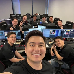 a selfie of me and my peers being successful game developers