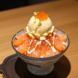 dslr food photograph of salmon and wasabi ice cream sundae with salmon roe and wasabi drizzle, 8 5 mm f 1. 8