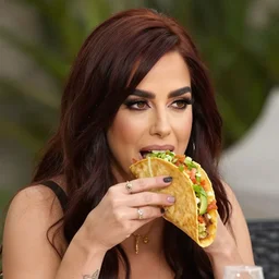 nelly furtado eating a taco