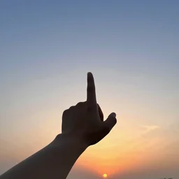 A hand reaching out and pointing to the sky, first person perspective, wide angle, pretty sky at sunset, digital art