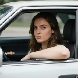 photo of a woman in a car by nicola kuperus
