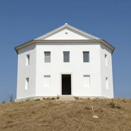 painted roman house on a hill