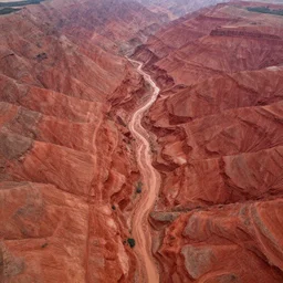 aerial view of red muddy valleys