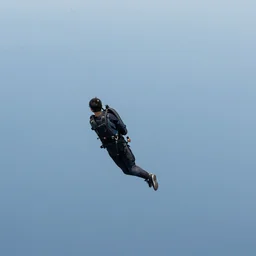flying with a hands free jetpack high in the sky