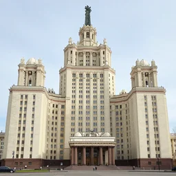 a wide shot of a soviet beautiful brutalist monumental building, with many rounded elements sprouting from the base tower creating a feel of an organic structure, photography shot at golden hour