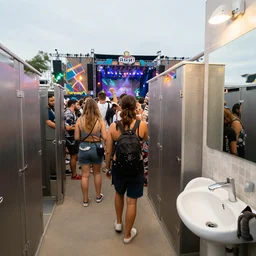 an EDM festival in a public bathroom