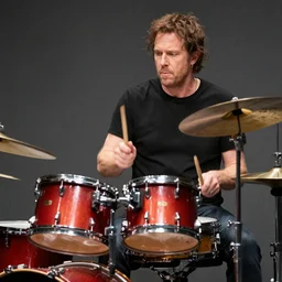 neil peart playing a vivid drum solo on turned over pots and pans