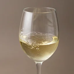 white wine in a glass swirling