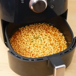 Cooking ramen noodle soup in an airfryer, photo