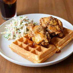 dslr food photograph of chicken and waffles with a side of coke slaw, 8 5 mm f 1. 8