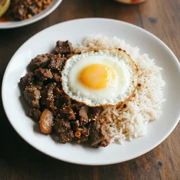 a plate of food with meat, rice, and an egg, a stock photo by anne rigney, pinterest contest winner, dau - al - set, lomo, contest winner, masterpiece