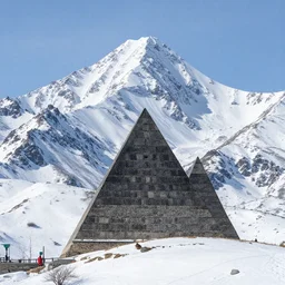 chrome pyramids high up in the snowy mountains