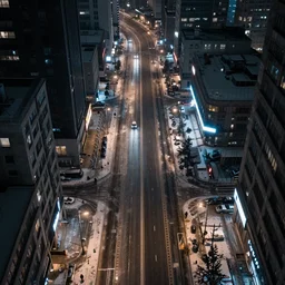 a city street at night, snowing, photograph, cyberpunk, sharp focus, intricate detail, Desolate, drone shot, high resolution, 8k neon streetlights