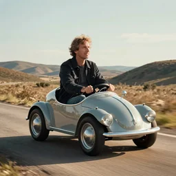 James May proudly drives a Bobby Car