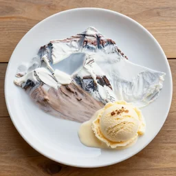 photo of mount everest made from neopolitan icecream on a plate