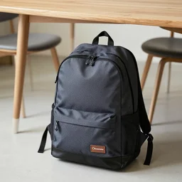 photo a backpack is placed under a table