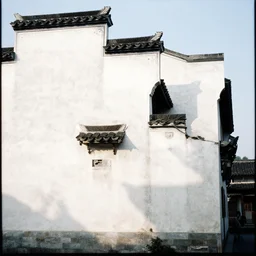 ancient chinese architecture, hui architecture, white walls, small tiles, architectural photography, film light