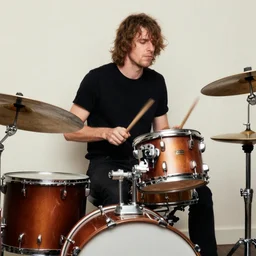 bach playing a drum kit