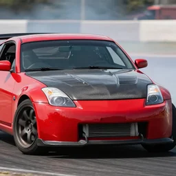 front close up action shot of a red drifting nissan 3 5 0 z with a carbon fibre hood, the car is drifting with the wheels turned, car photography, motion blur, 2 0 0 mm lens