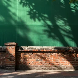 a brick railing in front of greenscreen