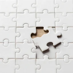 a puzzle with a missing piece