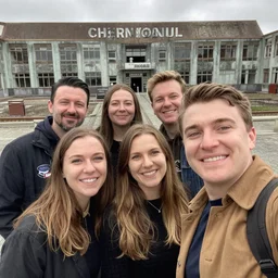 group of friends doing a selfie photo outside chernobyl