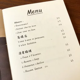 a piece of paper with a menu written on it
