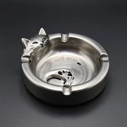 a photo of an ashtray in the shape of a cat