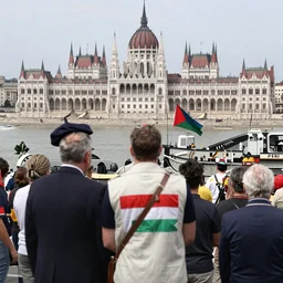 leader of fascist hungary, viktor orban, overseeing the war torn city of budapest during the siege 1 9 4 5