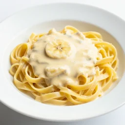 a creamy fettuccine pasta with banana sauce, food photography
