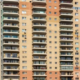 lots of stacked balconies of different size and colour