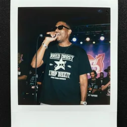 Fred Durst of Limp Bizkit performing at Western Carolina University, Polaroid photo, 8k, highly detailed
