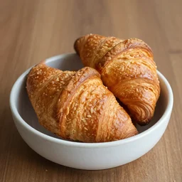 croissants in a ceramic bowl