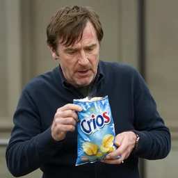 christopher eccleston stealing a bag of crisps