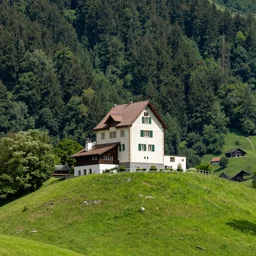 little castle on a forest hill in switzerland in the summer