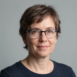 Portrait of a woman wearing glasses, short hair, by Mandy Jurgens