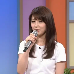 Japanese funny TV show in 1998. VHS footage. A cute woman singing on stage in the TV studio.