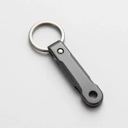 industrial design studio photograph, minimalist ultra modern designer multi tool that functions as a keyring