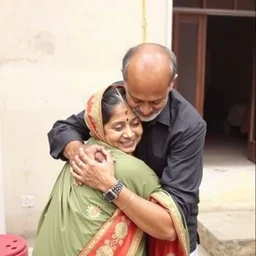 vinod purohit hugging a young geeta pai as anji watches