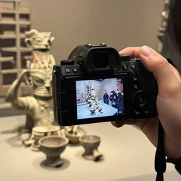 photo of human culture taken with an all knowing camera