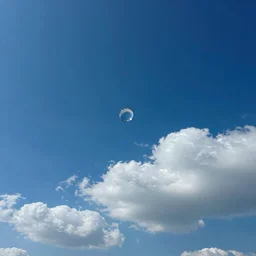 beautiful picture of the sky, high altitude, perfect cloudless blue sky filled with big drops of water, hot and sunny highly-detailed, elegant, dramatic lighting, artstation, 4k, cinematic landscape, photograph by National Geographic