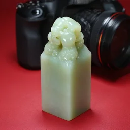 High-resolution image. A portrait of a polished canadian nephrite stone placed on a red table. DSLR camera with a large sensor. Deep shadows
