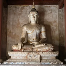 king ramkhamhaeng having a face and a figure which was imagined according to the characteristics of gentlemen and royalty in the sukhothai period. the appearance of the face is also modeled after the buddha image in the sukhothai period. built in a sitting position hanging his feet on the altar of manang silabat. the actual size of the altar is 4 meters long and 2.