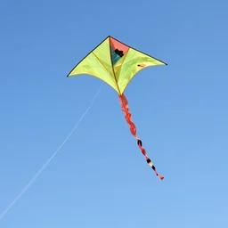 kites flying in a blue sky