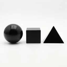 a black sphere | a black cube | a black pyramid, on a white background, in a row