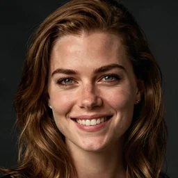 a portrait image of kate winslet with brown hair and green eyes, a wide smile and a genuinely happy and calm expression, looking directly at the camera